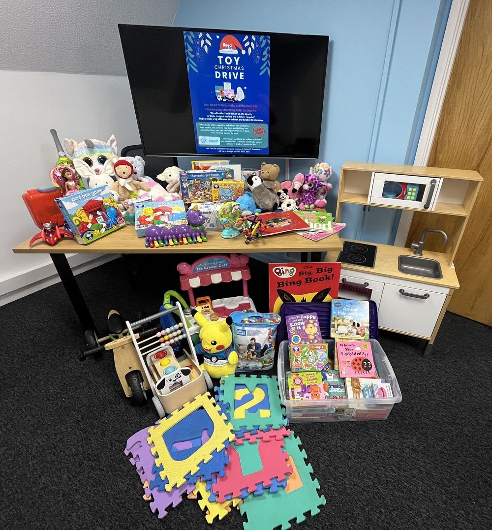 Toy collection for donation to White Lodge Centre, featuring a variety of toys such as dolls, action figures, and board games, ready to bring joy to children in need