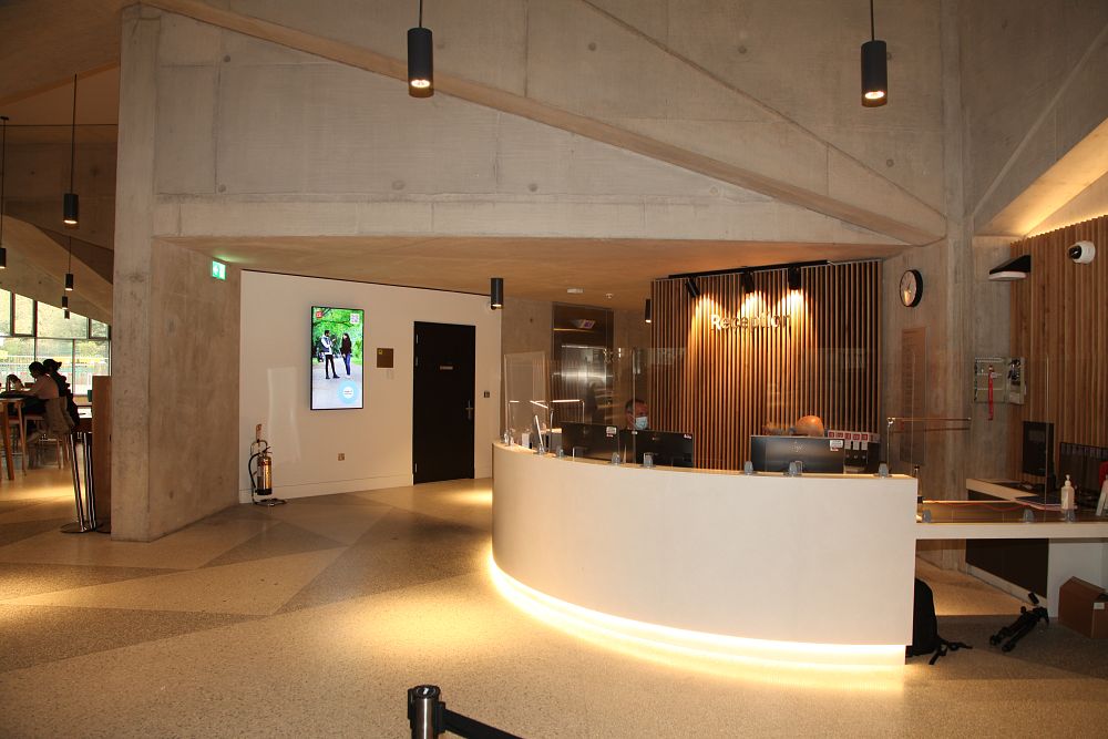 Reception area with curved desk at LSE.